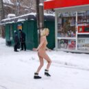 Naked blonde Diana tries to buy some goods at small shop