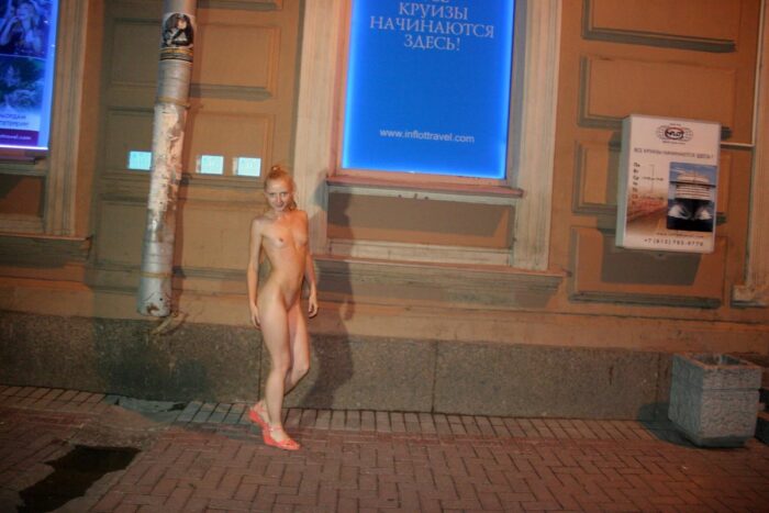 Naked blonde Vasilisa with sportcar at city center