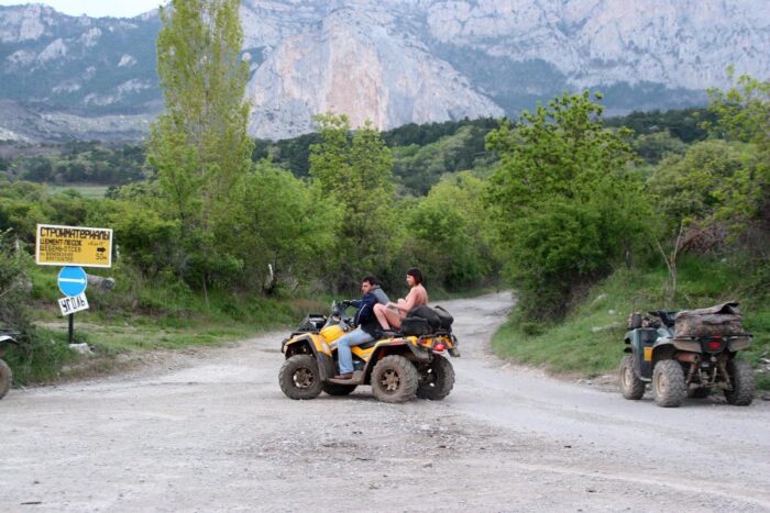 Russian girl Calla A without clothes is riding a quad