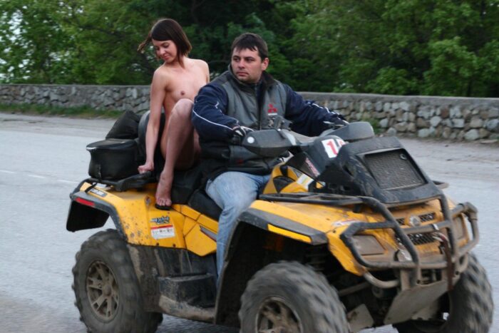 Russian girl Calla A without clothes is riding a quad