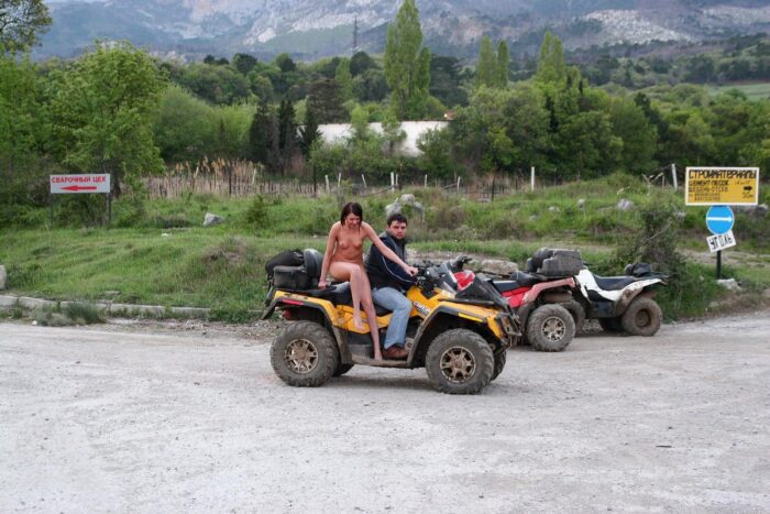 Russian girl Calla A without clothes is riding a quad