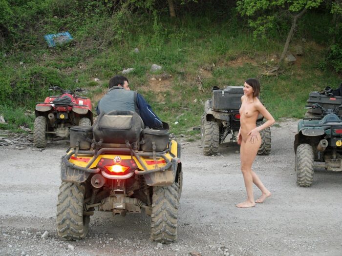 Russian girl Calla A without clothes is riding a quad