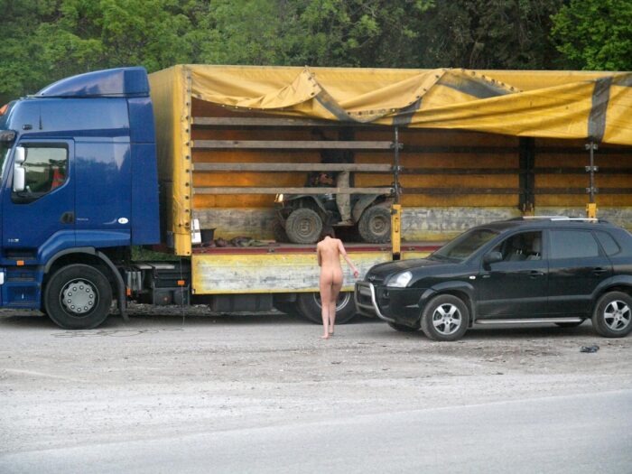 Russian girl Calla A without clothes is riding a quad