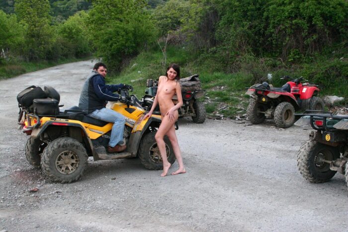 Russian girl Calla A without clothes is riding a quad