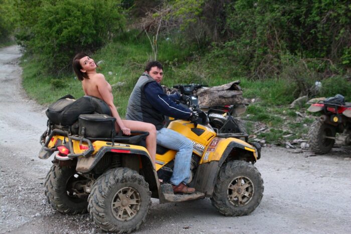 Russian girl Calla A without clothes is riding a quad