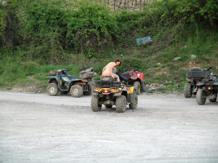 Russian girl Calla A without clothes is riding a quad