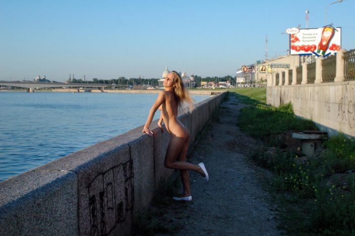 Blonde Natalia A with no clothes on the waterfront