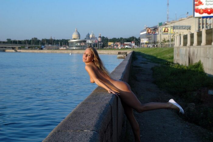 Blonde Natalia A with no clothes on the waterfront