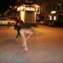 Blonde teen Vasilisa with sporty body flashes at night city