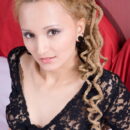 Neela sprawls all over the bed with an erotic striptease before hitting the sheets, showcasing her smooth slender body with delicate assets.