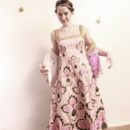 Russian girl Abbey plays with wooden spoon