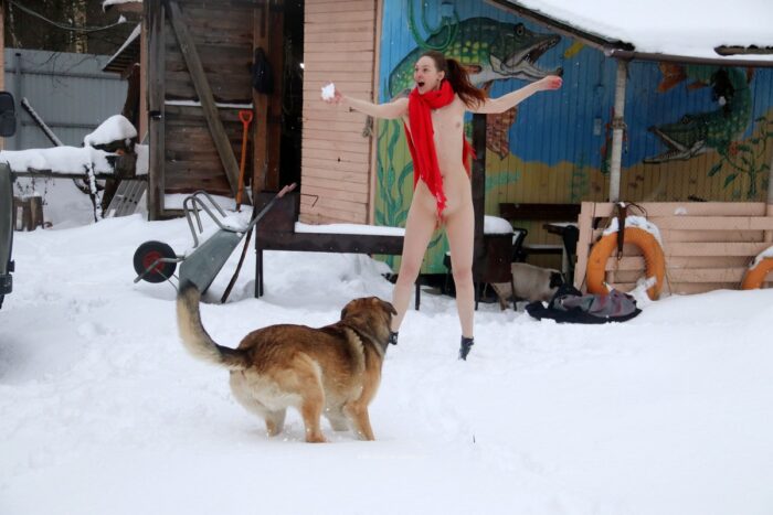 Russian girl Alina S plays with a god at winter