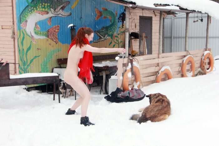 Russian girl Alina S plays with a god at winter