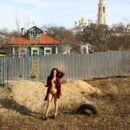 Small-tittied brunette Tatjana Y at village road