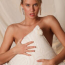 Venatione is Brigitte`s second series with MetArt and this blonde beauty is already showing a lot of potential. With her elegant allure and sultry look, pouting her pink lips as she flaunt her tanned body and sexy, round butt.