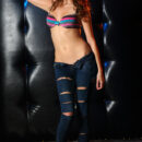 With her seductive gaze Avril strips her denim pants with matching multi-colored bra and confidently flirts and poses in front of the camera for her debut series.