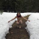 Young russian girl Natalia B shows her hairy pussy at winter forest