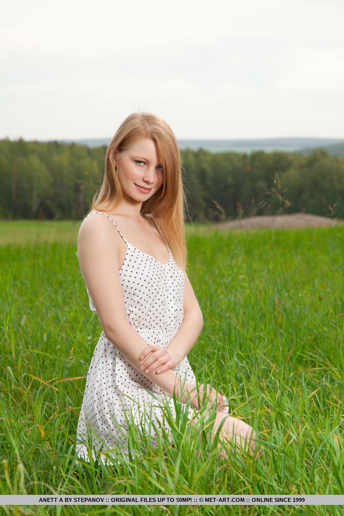 Anett A evokes a sweet and young maiden, her petite body all over the lush green grass as she spends an idyllic and carefree day under the sun.