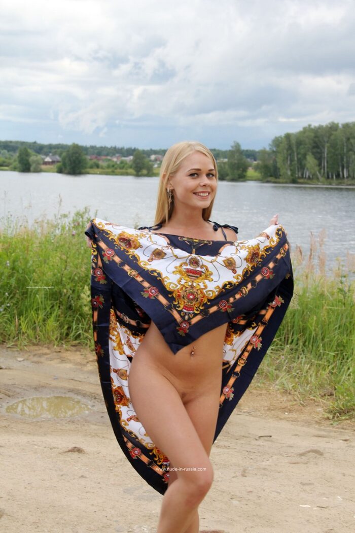 Beautiful russian blonde Sarika removes dress to show her hot body