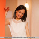 Delicate facial features, innocent gaze, and petite, nubile body, Bansari strips her cute white dress and poses sensually inside the bedroom.