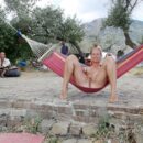 Girl Margarita S spreads her legs in a hammock on a camping