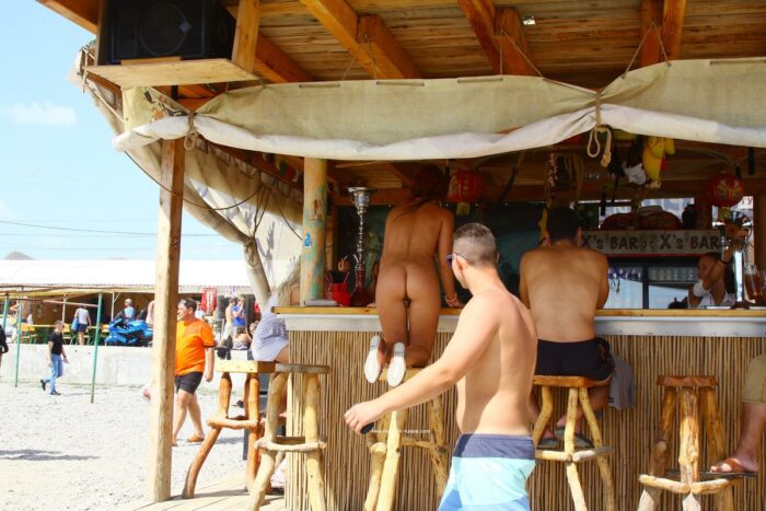 Margarita S orders cocktails at the beach bar absolutely naked