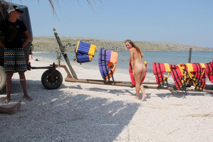 Naked babe Margarita S posing at not-nude beach