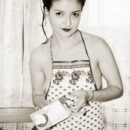 Naked girl Kira K eating dumplings in the kitchen