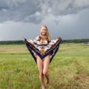 Sweet blonde Sarika shows her holes and masturbates in the fields