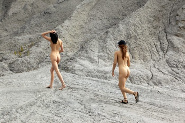 Three hot russian babes walk naked at sand quarry