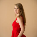 Eva Gold looks stunning in her red ensemble even more when she lifts her dress and uncover her bootylicious slim figure.