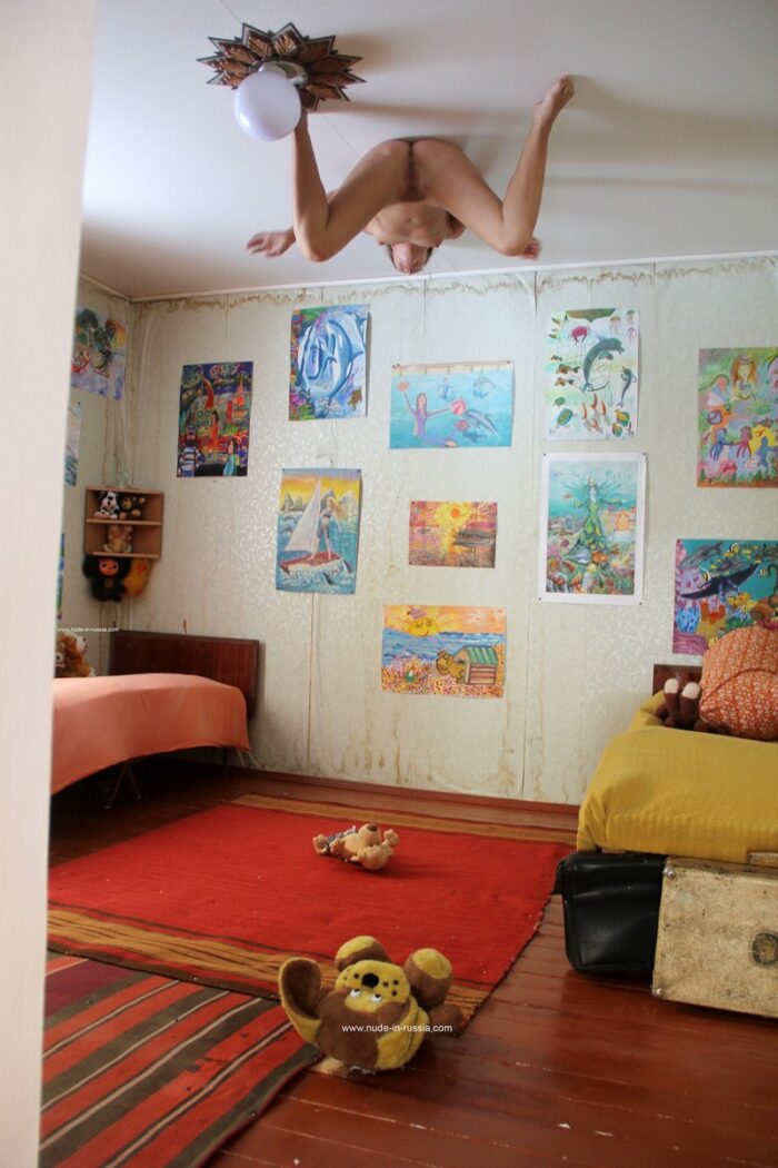 Naked russian girl Margarita S in upside-down house