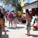 Russian girl Jana A undresses in a crowd of people