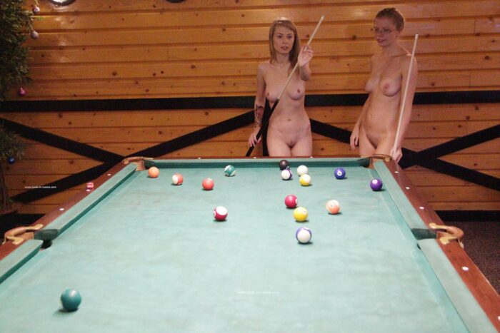 Two hot blondes play billiard naked and touch pussies