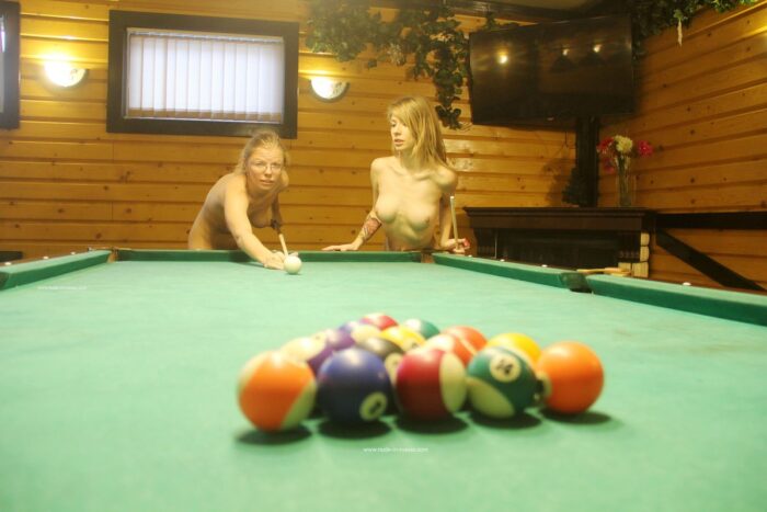 Two hot blondes play billiard naked and touch pussies