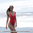 Elin looks like a Baywatch goddess in her red one-piece sexy swimsuit which eventually was taken off her slender body and uncover her juicy melons and beautifully sun-kissed skin.