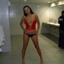 Brunette Julia P removes panties in the male toilet
