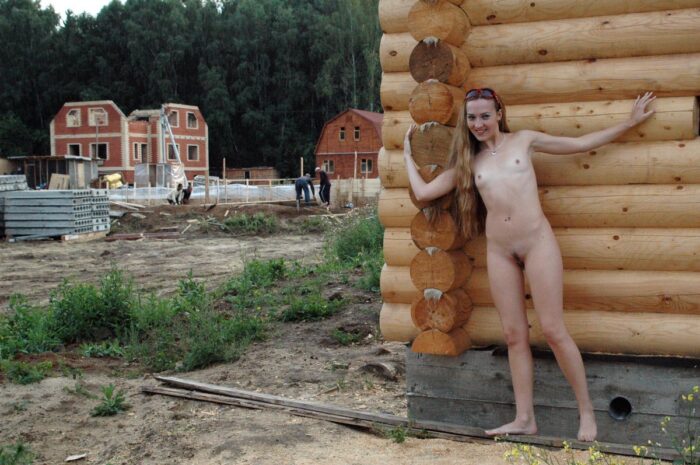 Naked blonde Asja with a vibrator hides from builders for the house