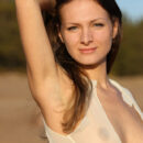 Zhanet A poses her sexy nude body in the hot wilderness