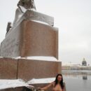 Beautiful Russian brunette Anna T poses naked at the monument in winter