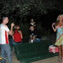 Blonde girl Maria Leonova undresses at night park in front of strangers