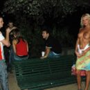 Blonde girl Maria Leonova undresses at night park in front of strangers