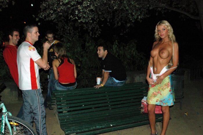 Blonde girl Maria Leonova undresses at night park in front of strangers