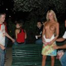 Blonde girl Maria Leonova undresses at night park in front of strangers
