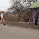 Bottomless blonde Ksenia Z walks to village residents