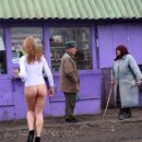 Bottomless blonde Ksenia Z walks to village residents