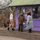 Bottomless blonde Ksenia Z walks to village residents