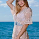 Dakota Pink stunningly removes her cover up and exposes her huge juicy melons and exquisite hourglass figure by the beach.