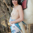 Nichole A evoking a beautiful nymph enjoying a carefree walk in the woods