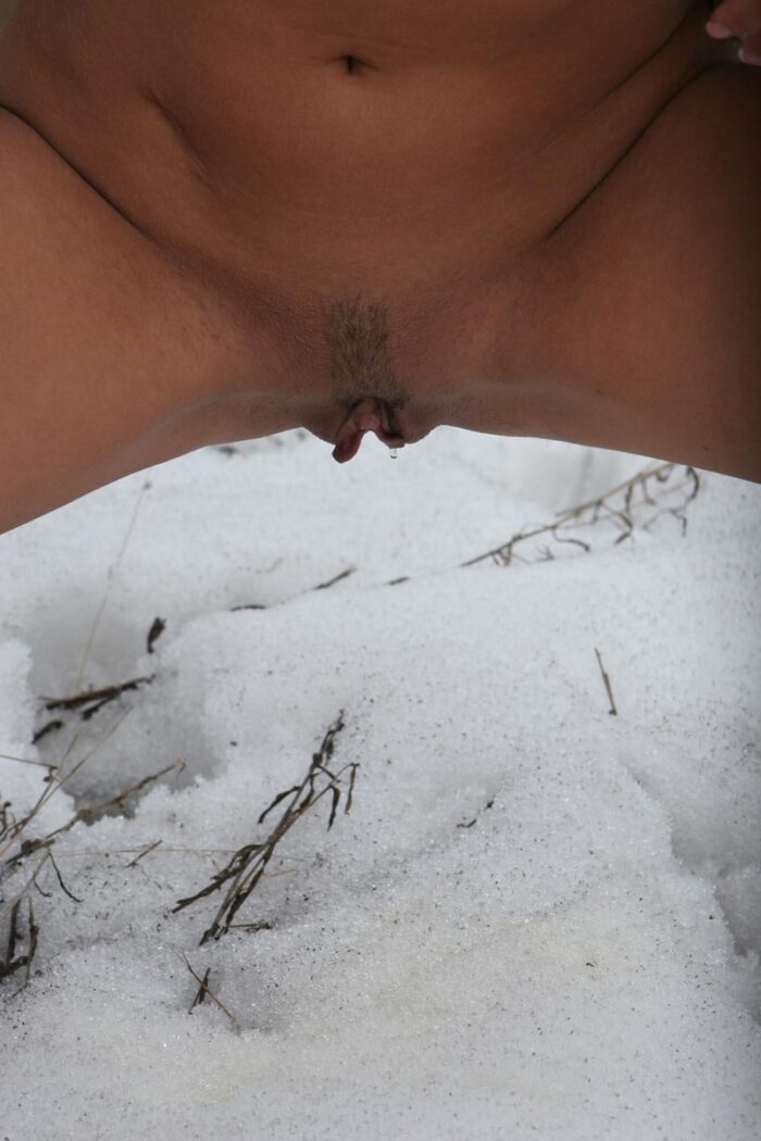 Russian teen blonde Olga K pisses in the snow